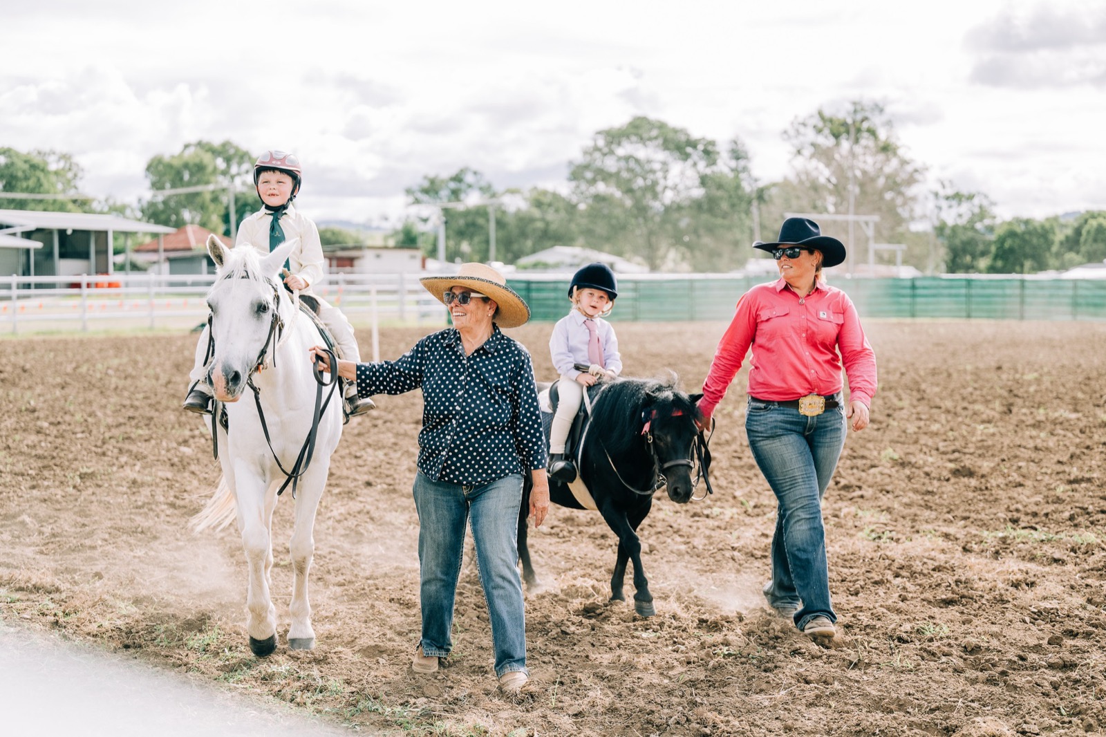 Young riders in lesson arena