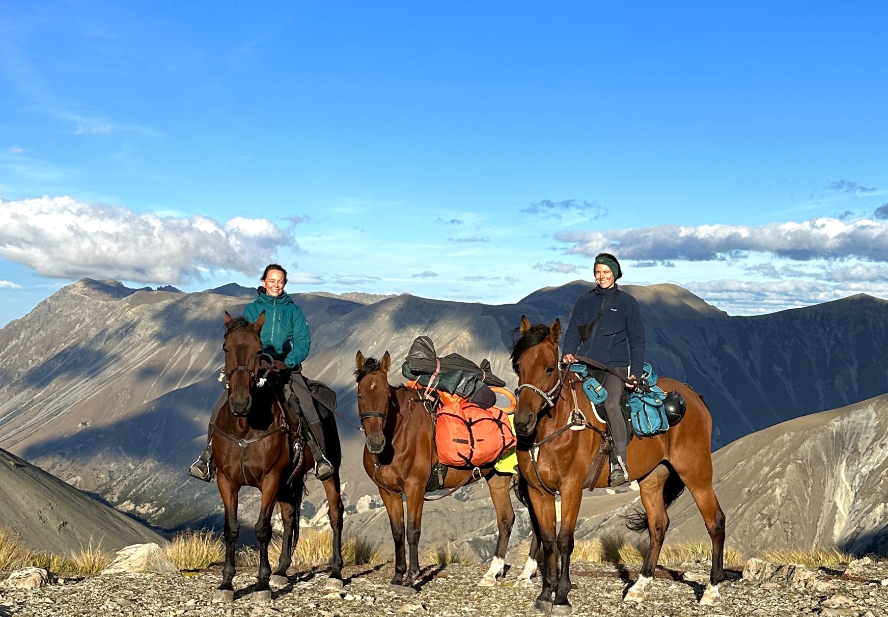 Karolin van Onna with Moose (L), and Nicole Kumpfmueller with Rasta (R), were accompanied by packhorse Alex.